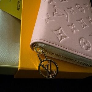 Louis Vuitton Pink Embossed Wallet, (Not Authentic)